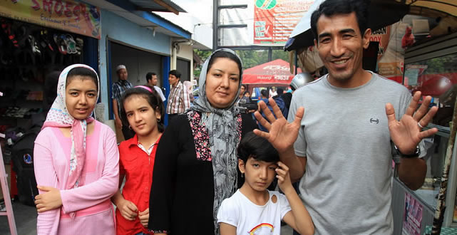 Indoesian family - Father, Mother and three girls